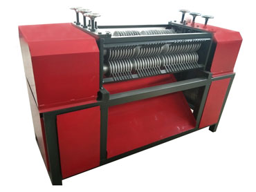 Radiator stripping machine