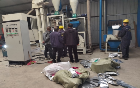 Chinese customer ordered 400-500kg/h aluminum plastic film recycling machine from Henan DOING
